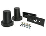 Two black extended bump stops with standard mounting plates and hardware pack for Toyota Tacoma.