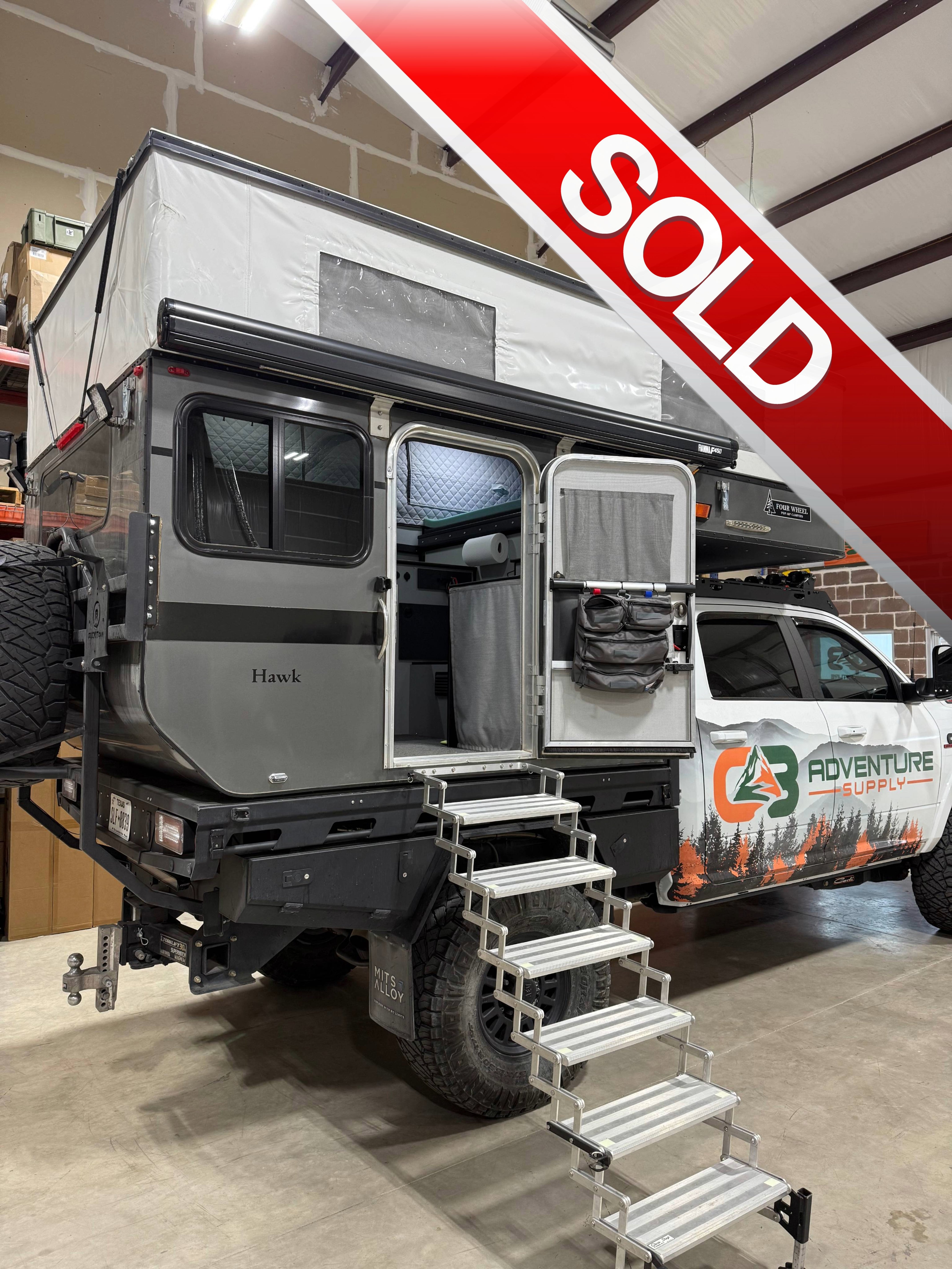 **Used/Demo** 2023 Hawk Flatbed Camper