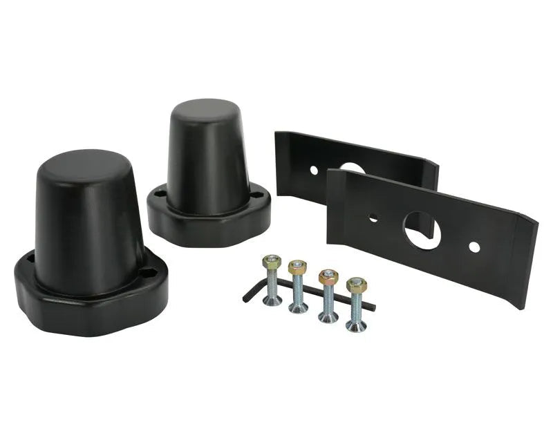 Two black DuroBumps premium off road rear bump stops with included standard mounting plates and hardware.